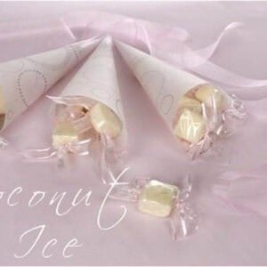 Cranberry Coconut Ice wrapped as a lolly on a pink background