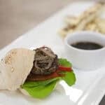 Mouse Burger on a white serving plate with a demi glaze