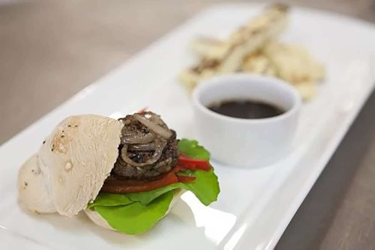 Mouse Burger and Squeaky Fries plated on a white serving dish ready to eat