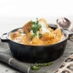 Thermomix Chicken curry on a white background with lots of chicken
