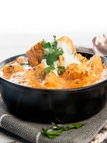 Thermomix Chicken curry on a white background with lots of chicken