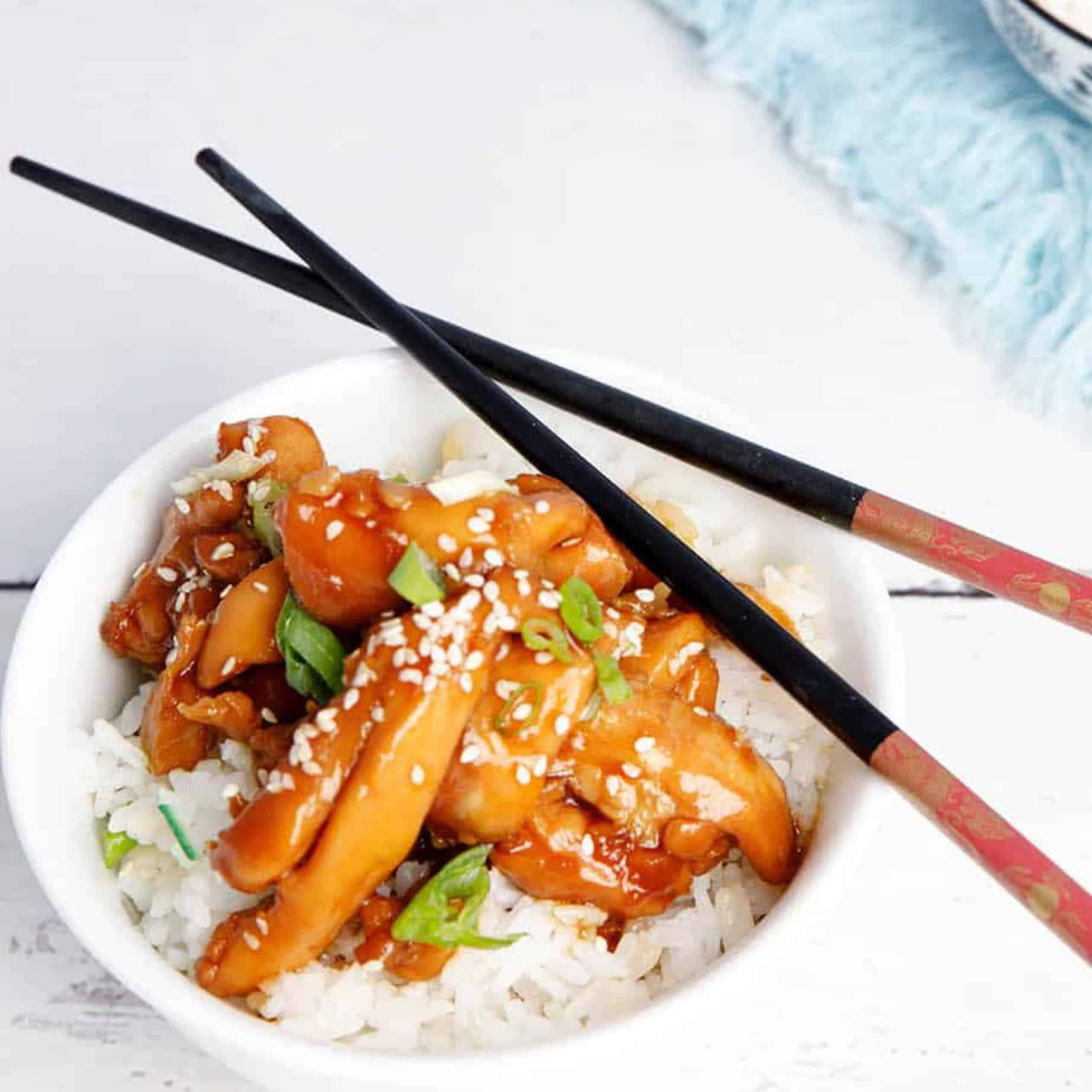 Teriyaki Chicken in a Japanese style bowl with chopsticks