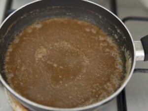 Caramel Tart filling bubbling on the heat