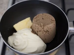 Caramel Tart filling being added to a saucepan